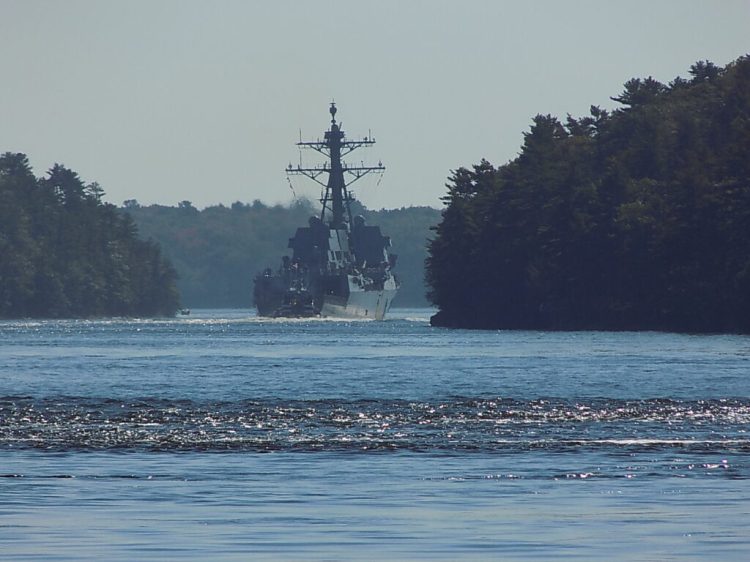 The USS Thomas Hudner clears Bluff Head in Arrowsic on its way out to sea, in this photo taken by Arrowsic resident Paul Kalkstein. ()