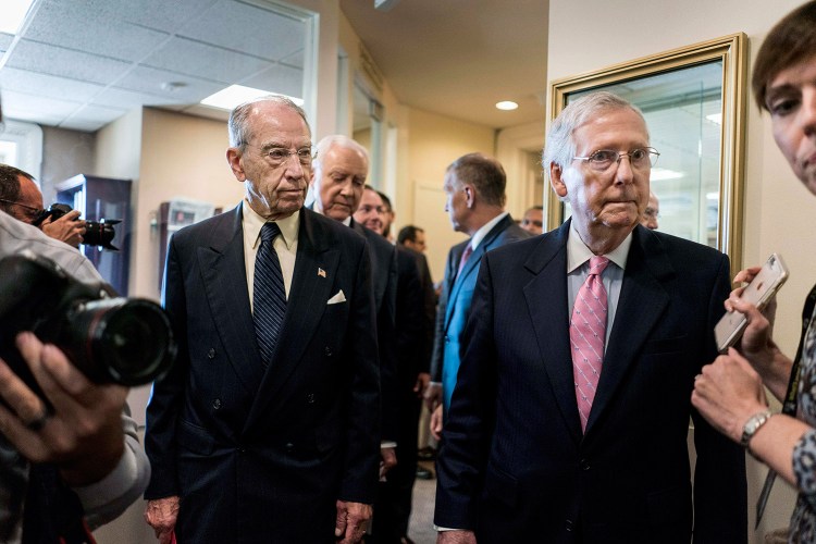 Senate Judiciary Committee Chairman Chuck Grassley, R-Iowa, and Senator Majority Leader Mitch McConnell, R-Ky., enter a press conference Thursday about Judge Brett Kavanaugh's nomination to the Supreme Court. Grassley said the new FBI report on Kavanaugh included "no hint of misconduct."