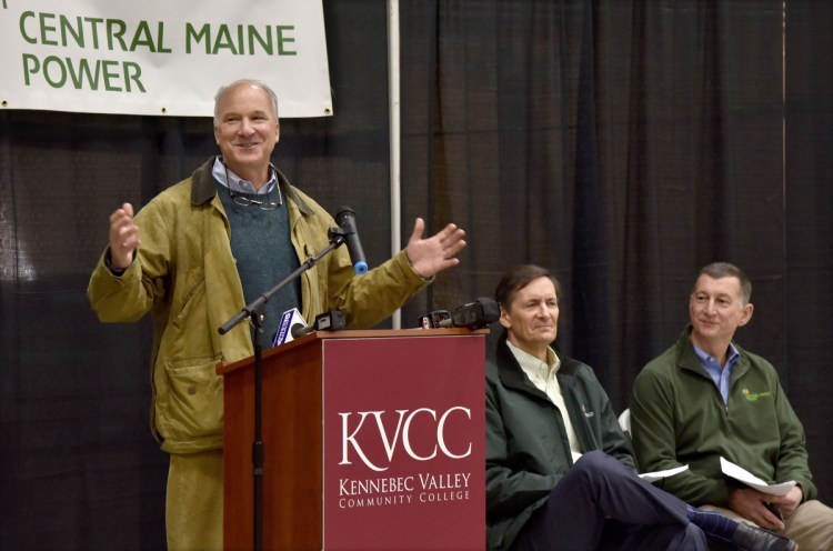 Derek Langhauser, left, president of the Maine Community College System, speaks to students and staff of the Kennebec Valley Community College electrical lineworkers technology program during an open house Wednesday in Fairfield. At right are Robert Kump, of Avangrid, and Doug Herling, of Central Maine Power Co.