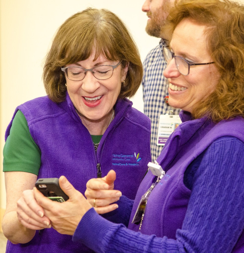 Sen. Susan Collins, R-Maine, left, chats with Gina Mosca after  speaking to home care and hospice workers at MaineGeneral Medical Center's Alfond Center for Health on Wednesday in Augusta.