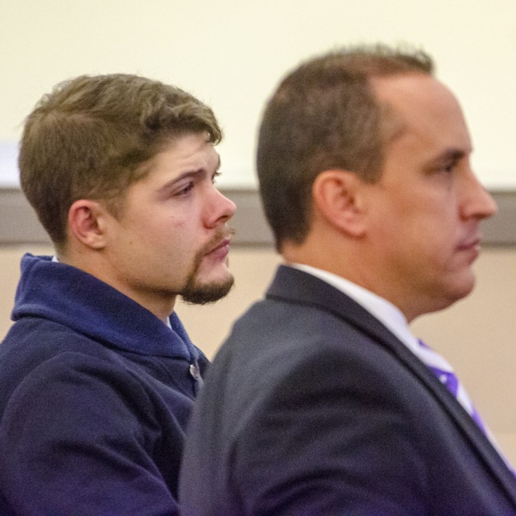 Tyler Goucher, left, and his defense attorney Darrick Banda sit in court Wednesday during a plea hearing at the Capital Judicial Center in Augusta.