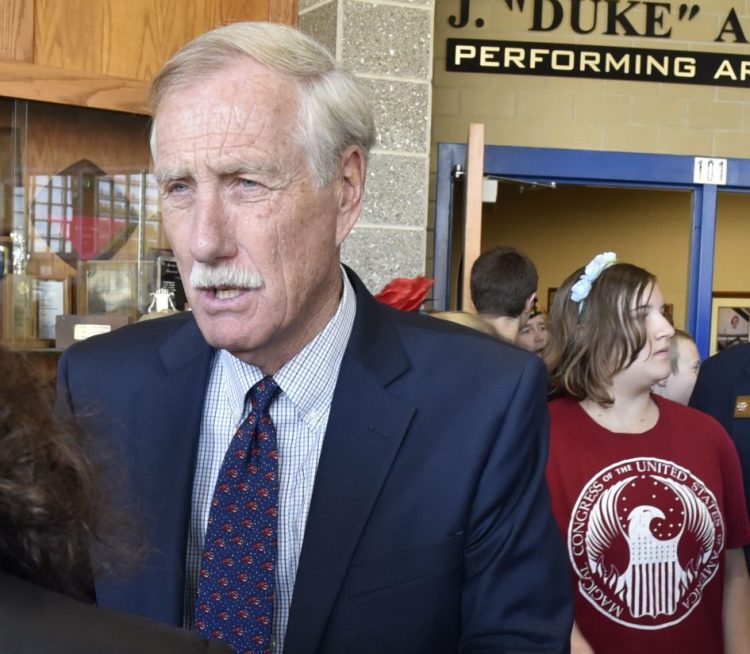 U.S. Sen. Angus King speaks with reporters Thursday after a Messalonskee Middle School Veterans Day assembly at Messalonskee High School in Oakland.
