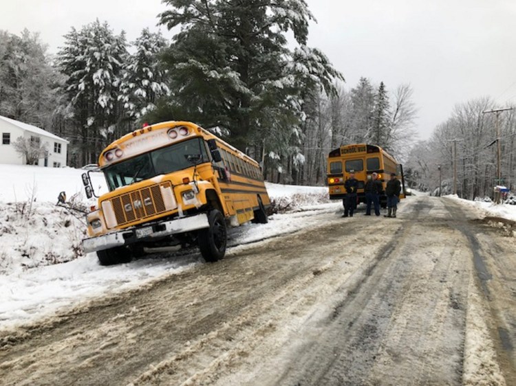 A school bus from Cornville Regional Charter School slipped off Malbons Mills Road during Tuesday's snowstorm. Five students suffered minor injuries and were taken to a local hospital by ambulance.