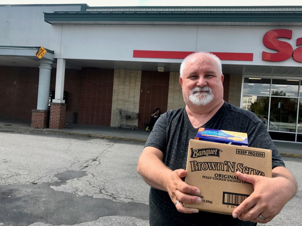 Dennis Mills, 63, of Waterville, pictured outside Save-A-Lot store on Aug. 15, said he supports a proposed ordinance that would ban plastic shopping bags at large retailers.