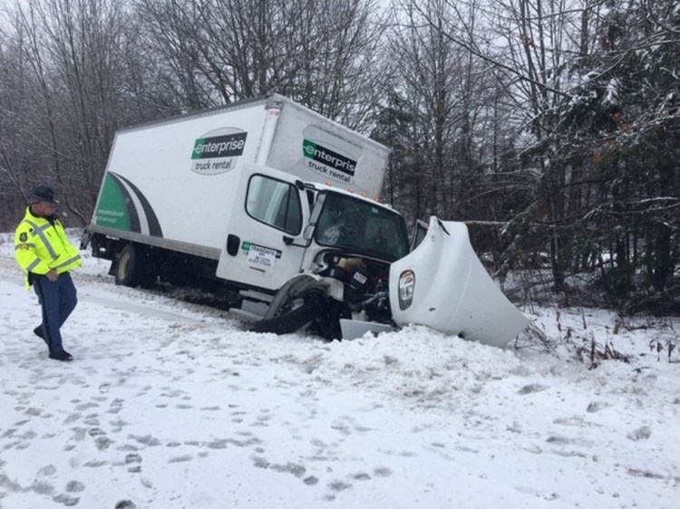 An Enterprise box truck is off the road on Route 3 following a fatal motor vehicle accident in front of Lake St. George State Park Tuesday morning.