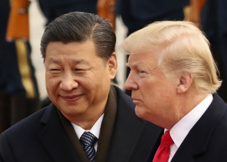 President Trump and Chinese President Xi Jinping participate in a welcome ceremony at the Great Hall of the People in Beijing in 2017.