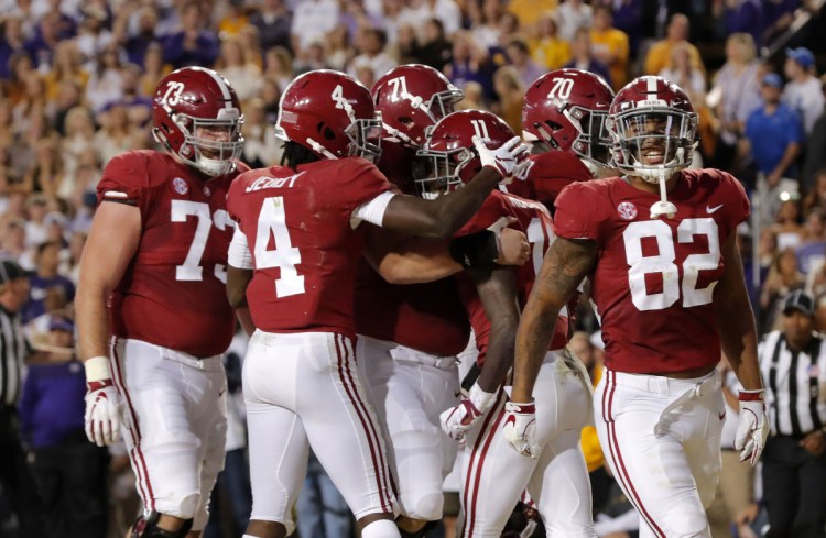 Alabama wide receiver Henry Ruggs III celebrates his TD reception against LSU.