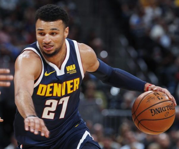 Denver's Jamal Murray scored 48 points Monday in a 115-107 win over the Celts. His 3-point shot with a second left angered Kyrie Irving, who threw the ball into the stands.