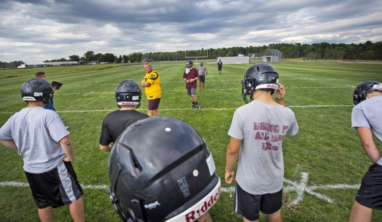 Dave Higgins, football coach at Greely, finished the season with 22 players, often dressing less than 20 for games. The team will lose 10 seniors, prompting the school to consider other options.