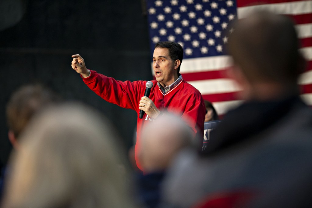 Scott Walker, governor of Wisconsin, speaks during a campaign rally at Weldall Manufacturing, in Waukesha, Wisconsin, on Monday. He lost his re-election bid.