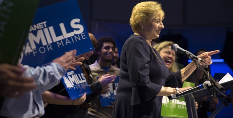 Gov.-elect Janet Mills gives her victory speech at the Maine Democrats' election night party in Portland on Tuesday. She is the first woman elected to the office in Maine history.