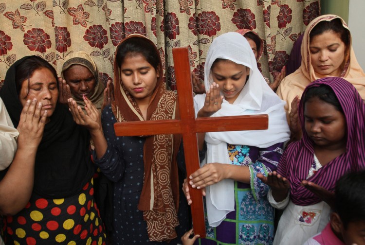 Pakistani Christians pray for Aasia Bibi, a Catholic mother of five who had been on death row since 2010 accused of blasphemy, in Multan, Pakistan, on Oct. 31.
