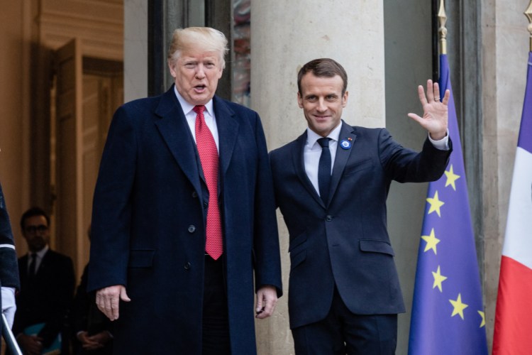 President Trump and French President Emmanuel Macron meet at the Elysee Palace during World War I commemoration ceremonies in Paris on Saturday. 