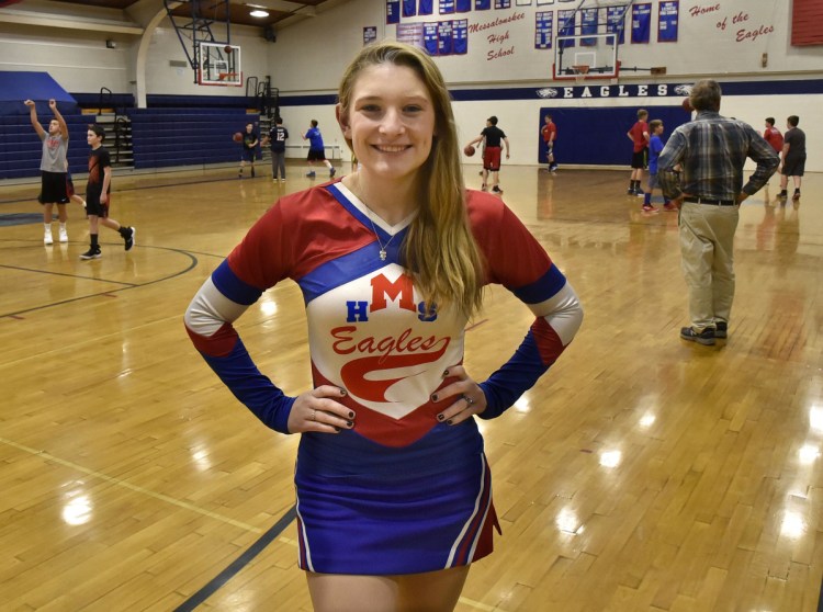 Messalonskee High School student Kaitlyn Berthiaume is the school's sole cheerleader.