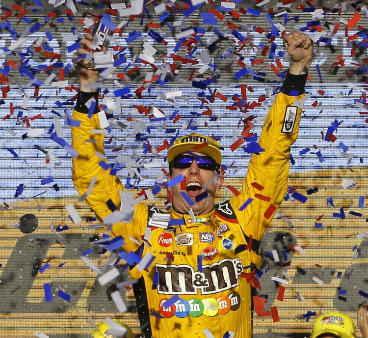 Kyle Busch celebrates Sunday after his eighth win of the season, which earned him a chance to race for the Cup Series title in the season finale next Sunday.