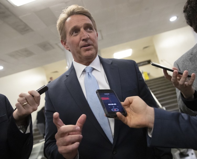 Sens. Jeff Flake, R-Ariz., above, and Chris Coons, D-Del., called for a vote Wednesday on legislation that would protect Russia probe special counsel Robert Mueller from being fired, but was rebuffed.