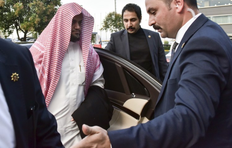 Saudi Arabia's top prosecutor Saud al-Mojeb walks to board a plane to leave in October.