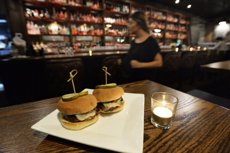 The meatloaf sliders are bacon-wrapped, tomato-jam-slathered discs of excellent housemade loaf topped with caramelized onions and the kitchen's own bourbon-infused ketchup.