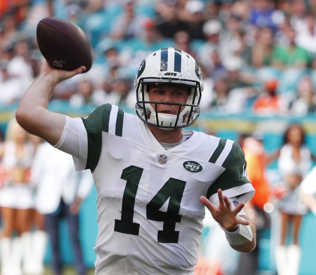 New York Jets quarterback Sam Darnold says his right foot is pain-free, but he remains out of practice.