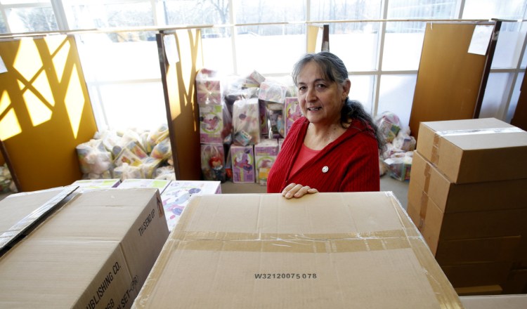 Kathleen Meade, executive director of the Press Herald Toy Fund, uses money donated by readers to buy over 10,000 gifts for Maine children in need.