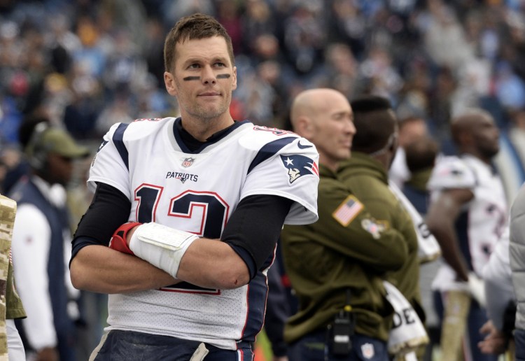 New England Patriots quarterback Tom Brady was absent at the start of practice Friday and is listed on the team's injury report after injuring his knee against Tennessee.