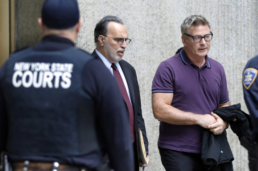 Alec Baldwin, right, and his attorney Alan Abramson leave New York Supreme Court on Monday.