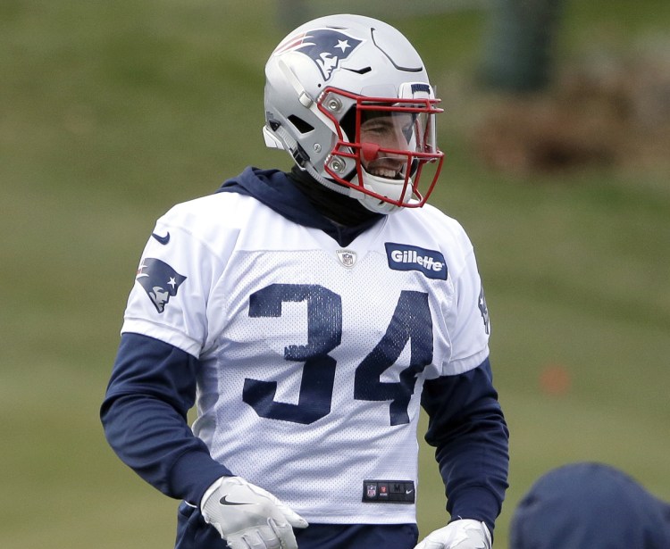 Rex Burkhead began the season as the No. 1 running back, but now will share time with Sony Michel and James White.