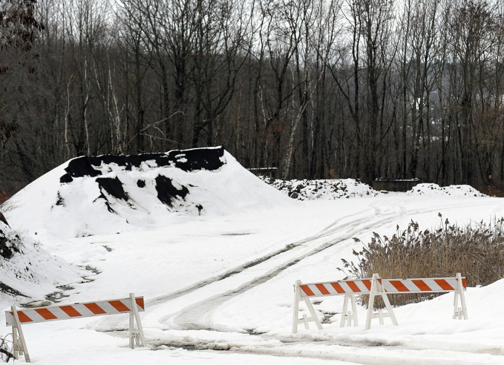 Barricades blocking the access road to a residence behind the Augusta Public Works site on North Street, shown Wednesday, have been moved aside.