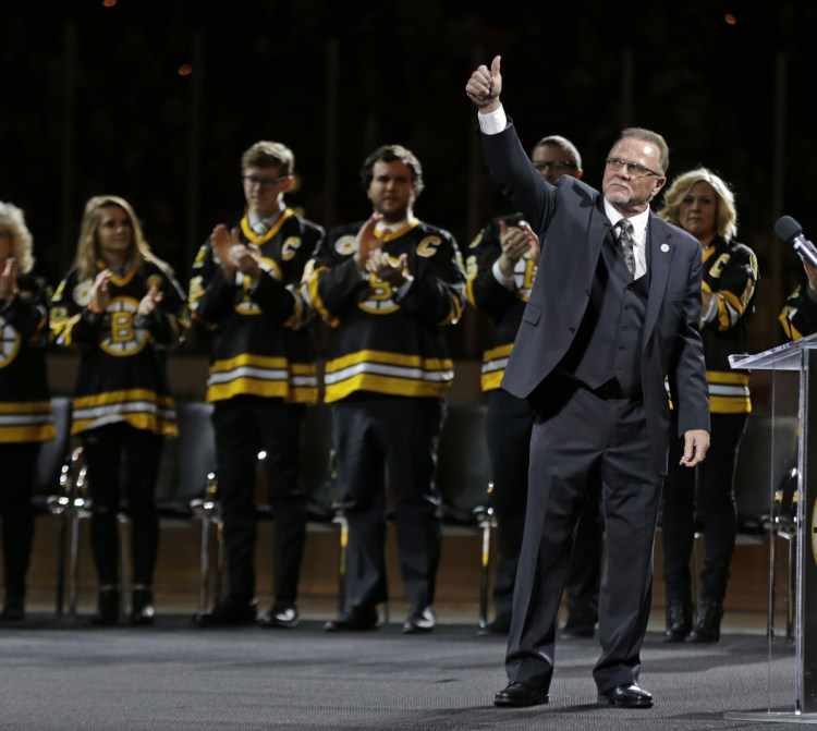 Rick Middleton acknowledges the crowd Thursday night during a ceremony to retire his No. 16 before his former team, the Boston Bruins, took on the New York Islanders at TD Garden.