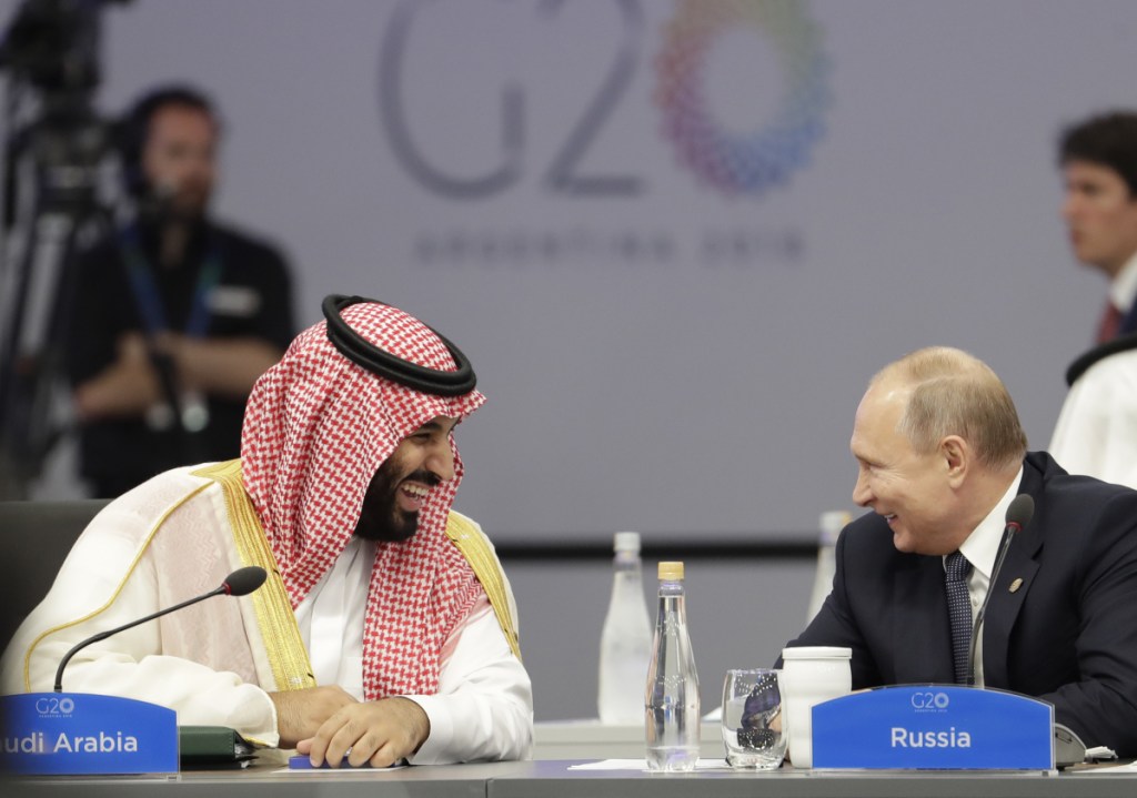 Saudi Arabia's Crown Prince Mohammed bin Salman and Russia's President Vladimir Putin speak at the start of the G-20 summit in Buenos Aires.