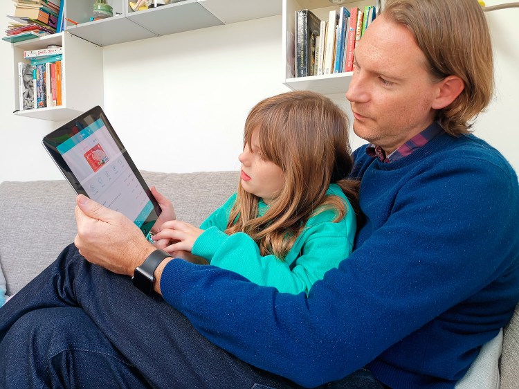 Paddy Kelly and his daughter Ailish use gohenry, one of a wave of digital banking apps for children, in London. 