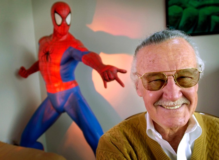 In this April 16, 2002, file photo, Stan Lee, 79, creator of comic-book franchises such as "Spider-Man," "The Incredible Hulk" and "X-Men," smiles during a photo session in his office in Santa Monica, Calif. Comic book genius Lee, the architect of the contemporary comic book, has died. He was 95. 
 (AP Photo/Reed Saxon, File)