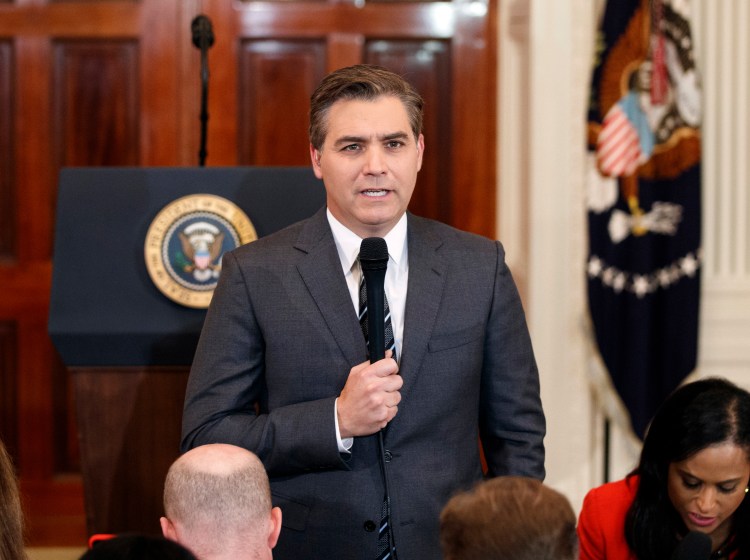 CNN journalist Jim Acosta does a standup before a news conference Nov. 7 with President Trump in the East Room of the White House in Washington. CNN sued the Trump administration Tuesday, demanding that correspondent Jim Acosta’s credentials to cover the White House be returned because it violates the constitutional right of freedom of the press. 