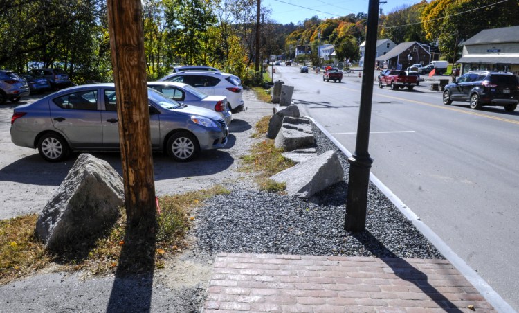 The new sidewalk ends at the Lucky Garden restaurant parking lot on Oct. 22, 2018, on Water Street in downtown Hallowell.