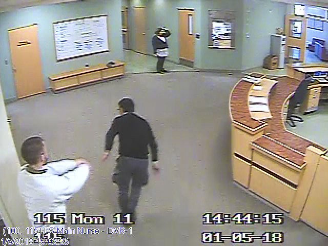 This still shot from Riverview Psychiatric Center video surveillance system footage shows Ahmad Khansari Nejad being shoved in the back Jan. 5 by "Patient W" on the hospital's Lower Saco forensic unit. Several clips from the video were played in court.