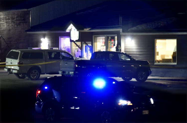 A state trooper is posted outside the Bear's One Stop store in Newport after a shooting Wednesday evening.