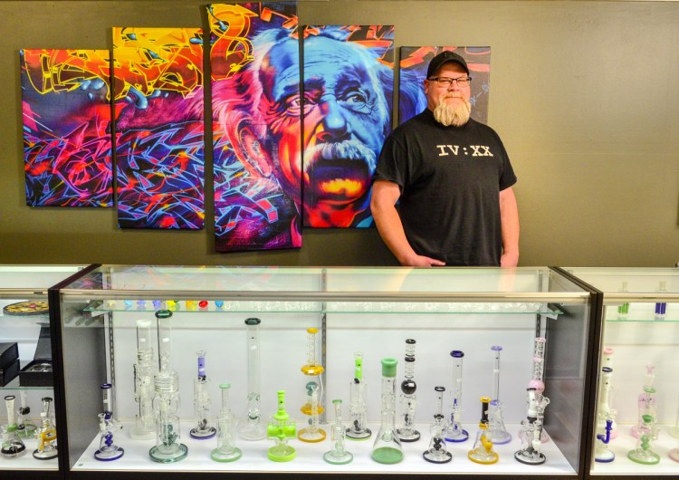 Owner-operator Derek Wilson poses for a portrait Thursday in The Cannabis Healing Center in Hallowell.