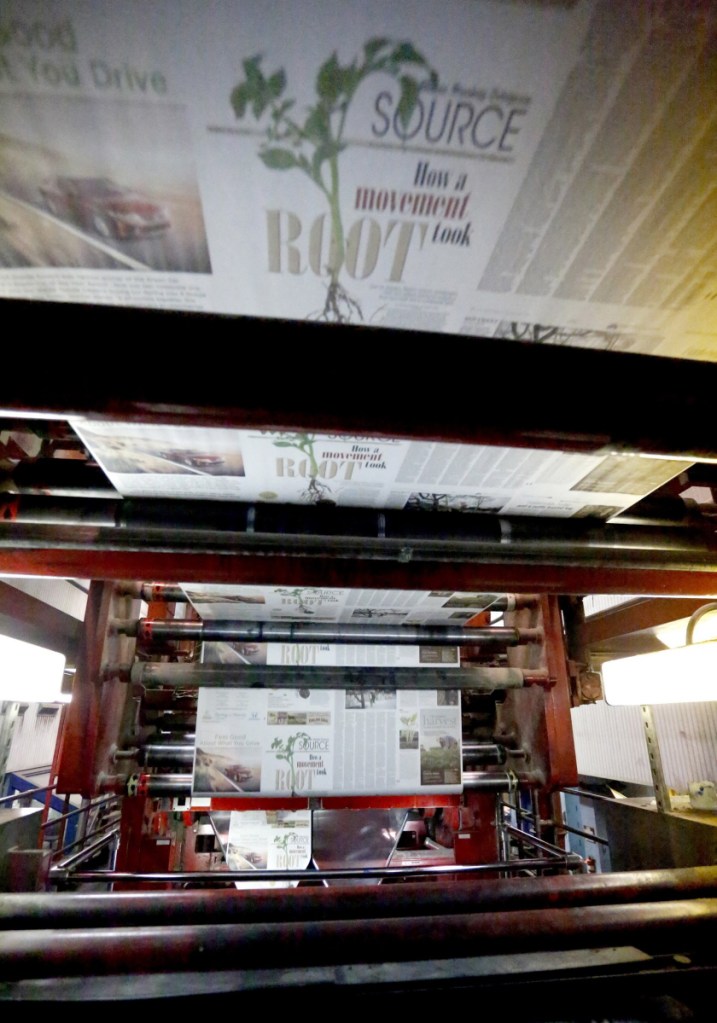 Tim Greenway/Staff Photographer
The fire-engine red Flexographic press cranking out pages circa 2014.