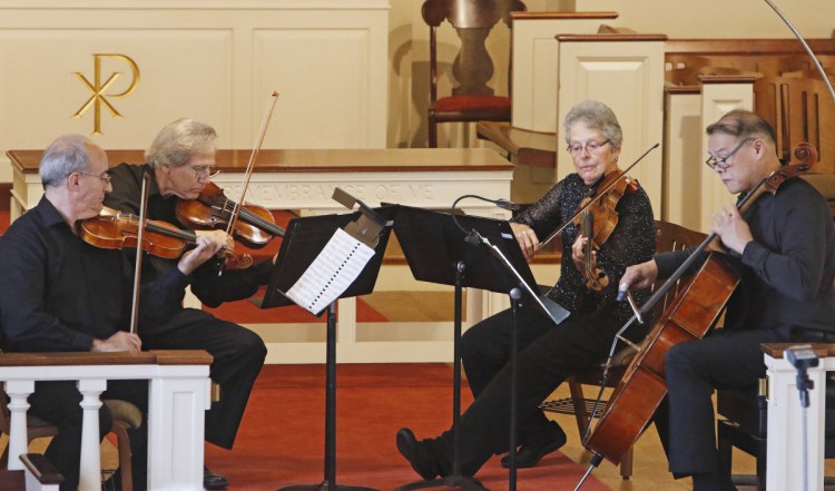 The Portland String Quartet performs at Woodfords Congregational Church in Portland in September.