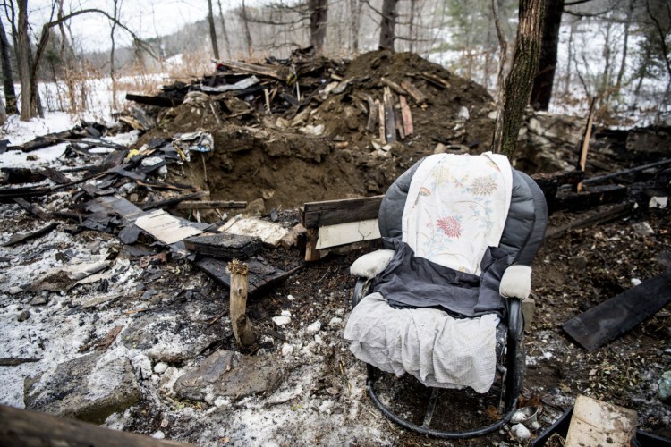 A chair and some appliances are all that remain at an abandoned house that was destroyed by fire early Saturday morning on North Avenue in Skowhegan. Authorities had to excavate the remnants of the house. It is the property where law enforcement earlier this year searched for Tina Stadig, who remains missing.
