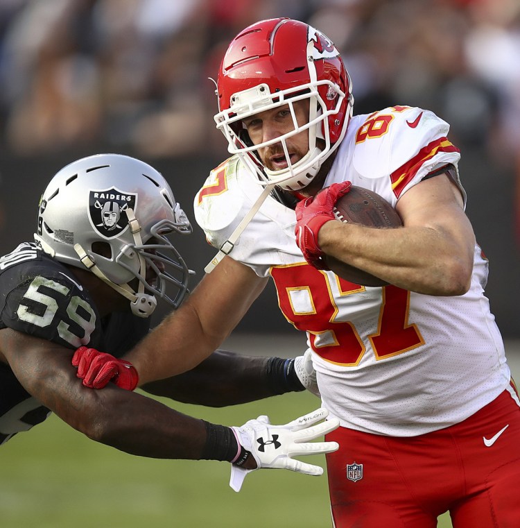Chiefs tight end Travis Kelce carved up Oakland's defense on Sunday, finishing with 12 catches for 168 yards and a touchdown.