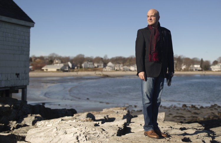Claude Morgan, incoming South Portland mayor, stands at at Fisherman's Point near Willard Beach on Saturday. "I actually love serving on the council. It's the closest thing to a family experience in my life," he says.