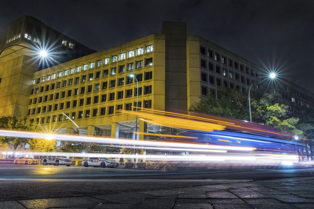 Traffic along Pennsylvania Avenue in Washington streaks past the Federal Bureau of Investigation headquarters building. The National Republican Congressional Committee said Tuesday that it was hit with a "cyber intrusion" during the 2018 midterm campaigns and has reported the breach to the FBI.