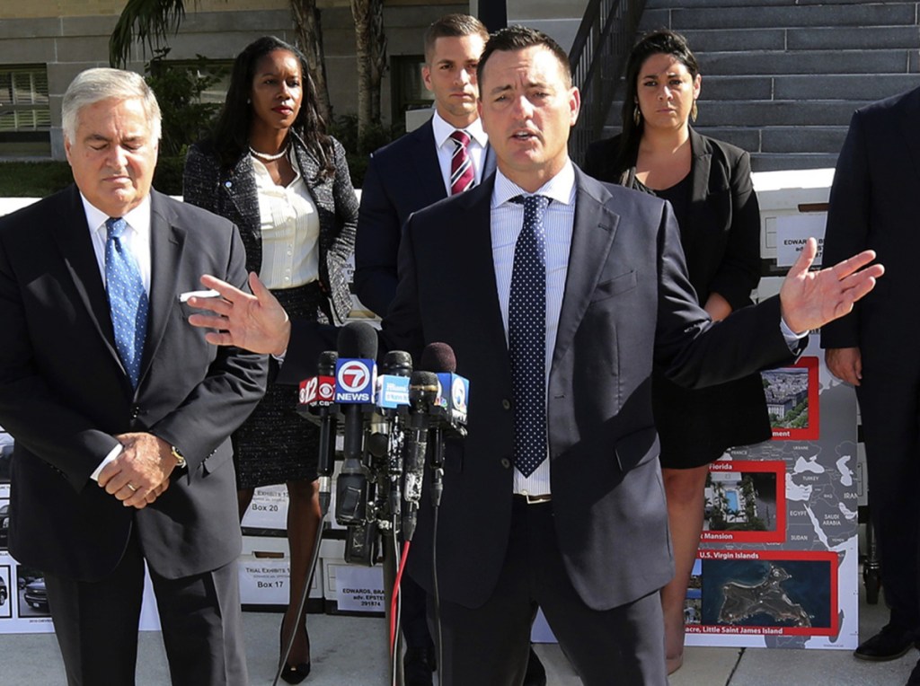 Attorney Brad Edwards holds a press conference following Jeffrey Epstein's settlement on Tuesday in Palm Beach. Labor Secretary Alexander Acosta, left, was the attorney who approved Epstein's secret deal in 2008 and helped him avoid a lifetime jail sentence.