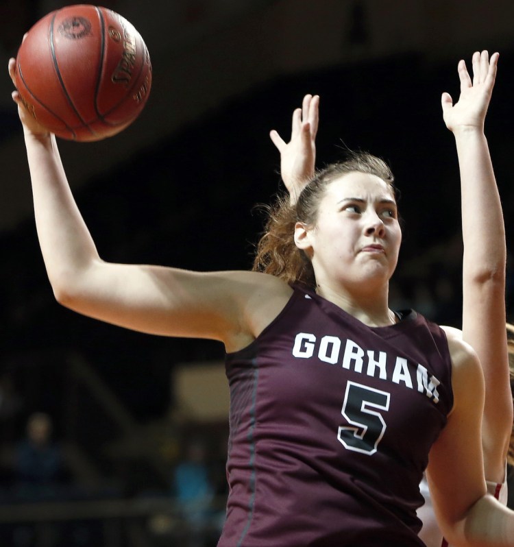 PORTLAND, ME - FEBRUARY 20: Gorham's Mackenzie Holmes comes away with a rebound during a semifinal game against South Portland on Tuesday at Cross Insurance Arena. (Staff photo by Ben McCanna/Staff Photographer)