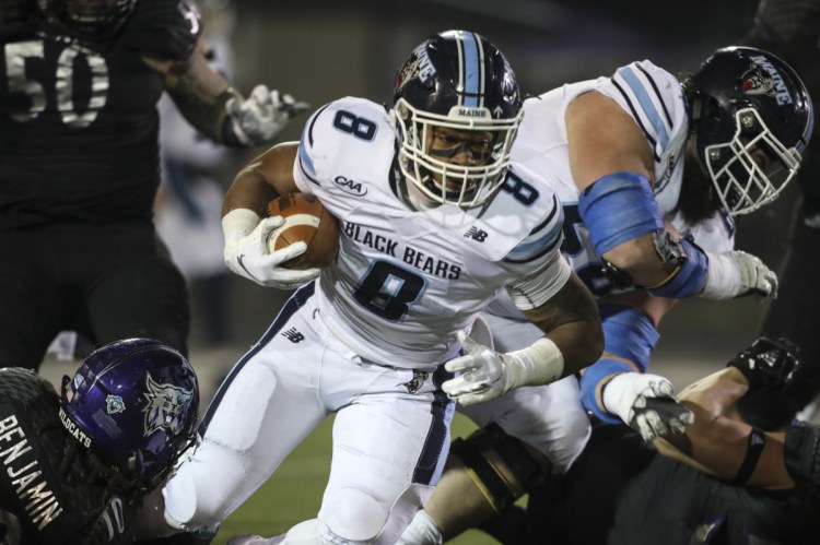 Maine running back  Ramon Jefferson runs the ball in the first half of the Black Bears' 23-18 win over Weber State in the FCS quarterfinals on Friday night in Ogden, Utah.