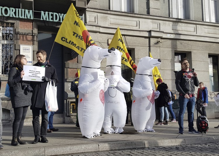 Activists dressed in polar bear costumes call for nuclear energy to replace fossil fuels on the sidelines of a climate march in Katowice, Poland, on Saturday. Associated Press/Frank Jordans