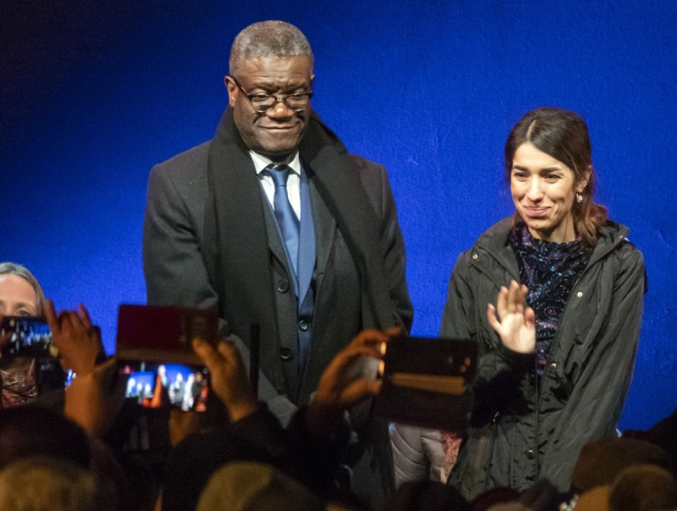 Dr. Denis Mukwege and Nadia Murad, Nobel Peace Prize winners for their efforts to end the use of sexual violence as a weapon of war, arrive at the Nobel outdoor concert in Oslo, Norway, on Sunday.