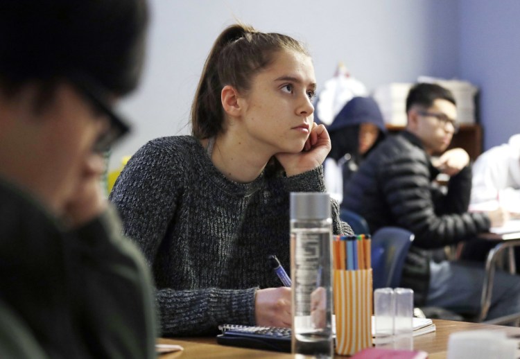 Hazel Ostrowski attends class at Franklin High School on Wednesday in Seattle. She and other students wore activity monitors to discover whether a later start to the school day would help them get more sleep.