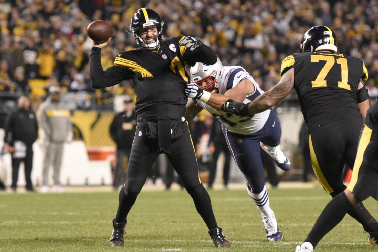Pittsburgh Steelers quarterback Ben Roethlisberger gets off a pass while New England Patriots middle linebacker Kyle Van Noy tries to tackle him during the second half of the Patriots' 17-10 loss on Sunday in Pittsburgh.